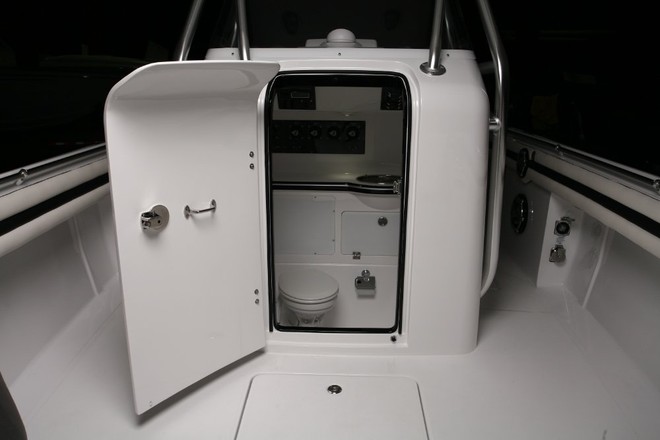 Clever design. A full stand-up head and shower compartment aft of the console aboard the ’Top Fish.’ - Cigarette legend goes fishin © Cigarette Racing